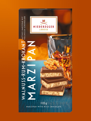 נידרגר – שוקולד מרציפן חלב ען מילוי אגוזים ורום 110 גרם