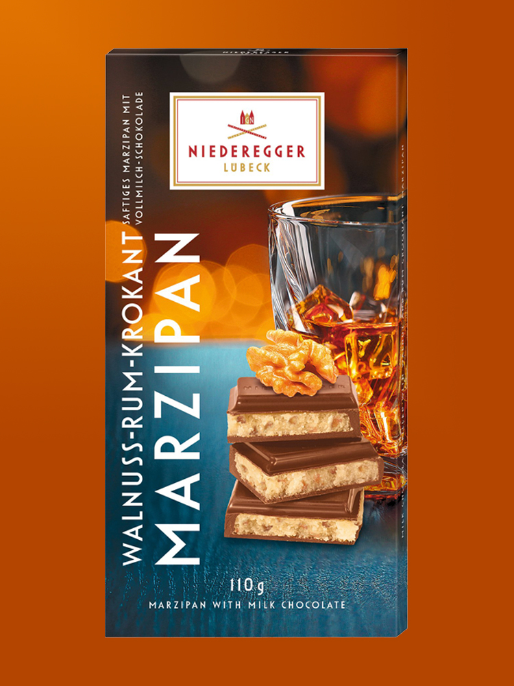 נידרגר – שוקולד מרציפן חלב ען מילוי אגוזים ורום 110 גרם